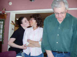 Miranda kisses Mom behind Dad's back
